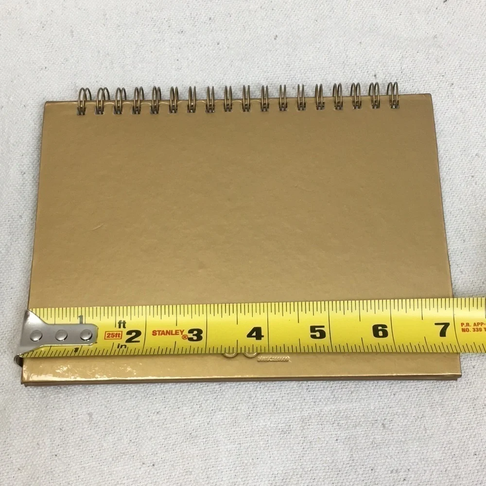 Spiral bound Olympic photo album/frame